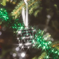 Ornement de fête en métal argenté