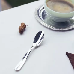 Petite cuillère universelle en métal argenté