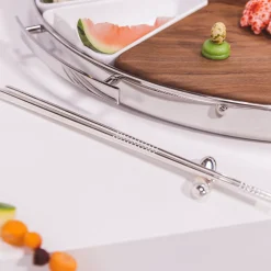 Repose Baguettes en métal argenté