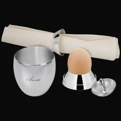 Timbale, coquetier, rond de serviette et toupie en métal argenté